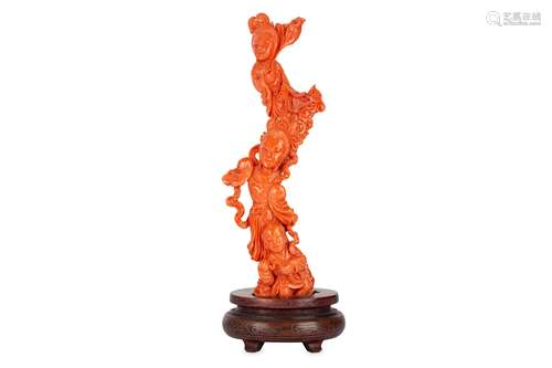 A CHINESE CORAL 'IMMORTALS' CARVING.