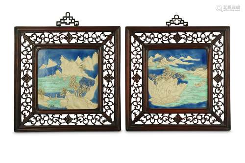 A PAIR OF CHINESE GLAZED BISCUIT 'LANDSCAPE' PANELS.