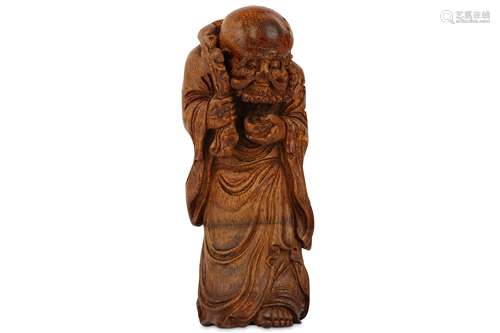 A CHINESE BAMBOO CARVING OF LUOHAN.