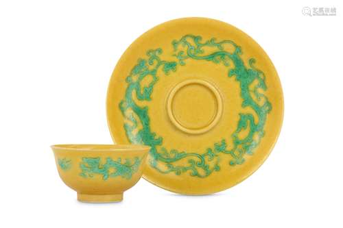 A CHINESE YELLOW-GROUND GREEN 'DRAGON' TEA BOWL AND SAUCER.