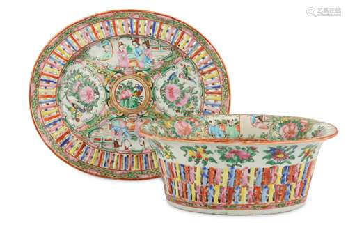 A CHINESE FAMILLE ROSE RETICULATED BASKET AND STAND.