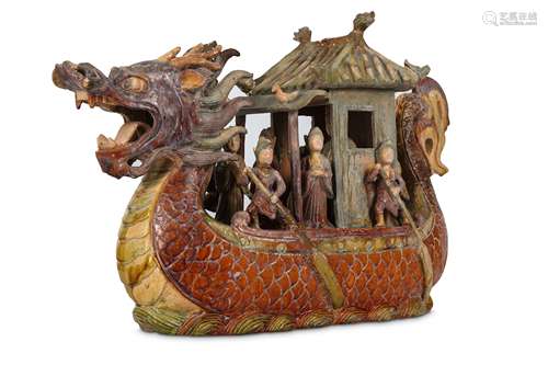 A CHINESE GLAZED POTTERY MODEL OF A DRAGON BOAT.