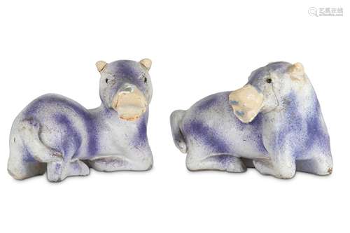 A PAIR OF CHINESE PURPLE-GLAZED ANIMALS.