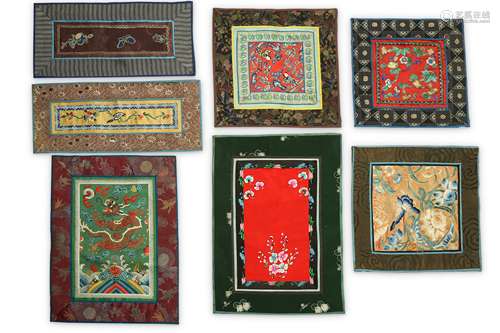 TWENTY-ONE CHINESE EMBROIDERED MATS.