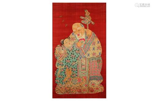 A CHINESE RED-GROUND 'SHOULAO AND BOY' TEXTILE HANGING SCROLL.