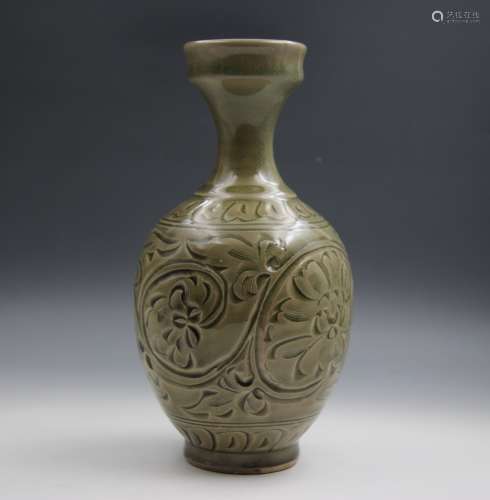 A Chinese Porcelain Carved Vase