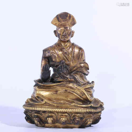A Bronze Gilding Guru Buddha