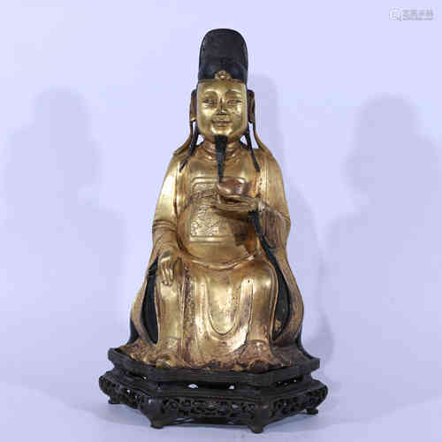 A Chinese Bronze Gilding Fortune God