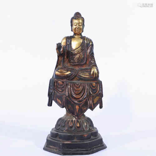A Chinese Bronze Gilding Buddha