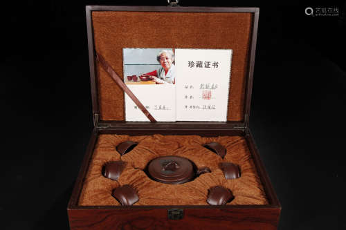 A Chinese Zisha Purple Clay Tea Set