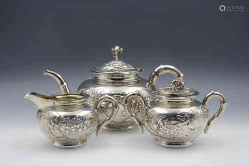 A Chinese Silver Tea Pot, Jar and Cup