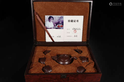A Chinese Zisha Purple Clay Tea Set