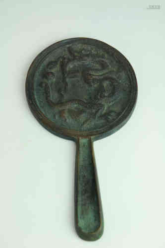A Chinese Bronze Handle Mirror