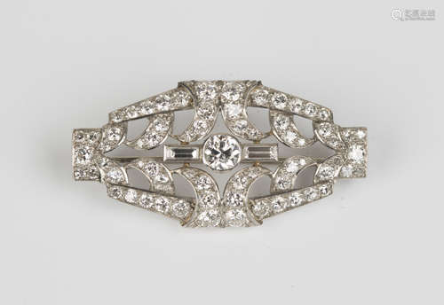 A platinum and diamond brooch, the principal collet set circular cut diamond between two baguette