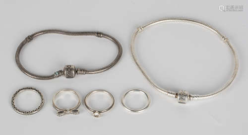 A group of Pandora silver jewellery, comprising a gilt neckchain, a pendant with a neckchain, two