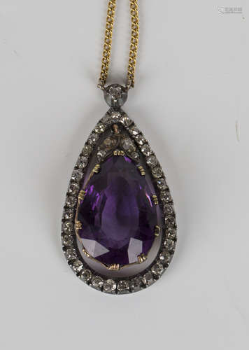 An amethyst and circular cut diamond pendant, claw set with a pear shaped amethyst to the swing