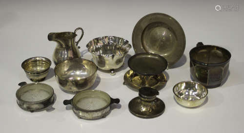 A small group of silver items, including a late Victorian bowl with pinched wavy rim, London 1897 by