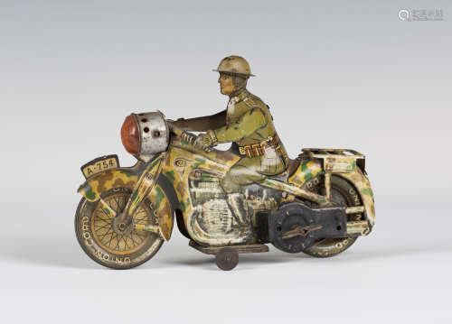 An Arnold tinplate clockwork A-754 army dispatch motorcycle and rider, length 19cm (some playwear,