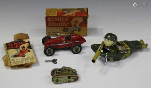 A Schuco Studio tinplate The Steerable Driving-School Car, length 13.5cm, boxed with some