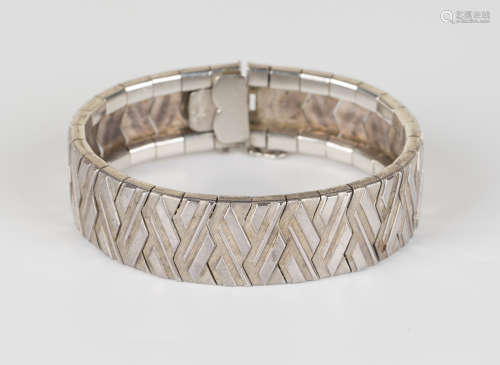 A German .925 silver bracelet, decorated with a geometric design, on a snap clasp, length 19cm.