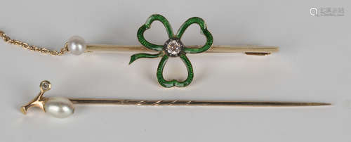 A gold, green enamelled, diamond and seed pearl bar brooch, the centre mounted with an openwork