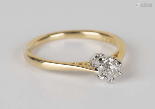 An 18ct gold and diamond single stone ring, claw set with a cushion shaped diamond, ring size approx