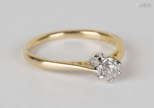 An 18ct gold and diamond single stone ring, claw set with a cushion shaped diamond, ring size approx