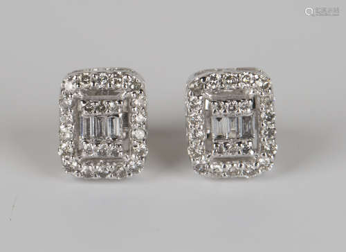 A pair of 18ct white gold, circular and baguette cut diamond earrings, each in a rectangular