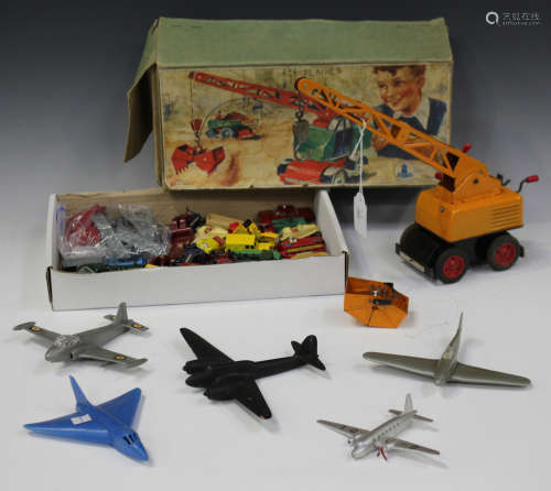 A Strenco Western Germany tinplate mechanical crane with clam shell bucket, boxed, a Dinky Toys