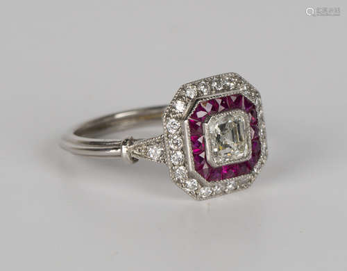 A platinum, 18ct white gold, diamond and ruby ring, mounted with the principal asscher cut diamond