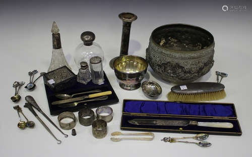 A group of assorted mostly silver items, including a late Victorian button hook with leopard head