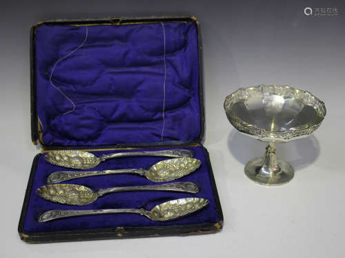 A George V silver pedestal bonbon dish with a pierced rim, raised on a circular foot, Birmingham