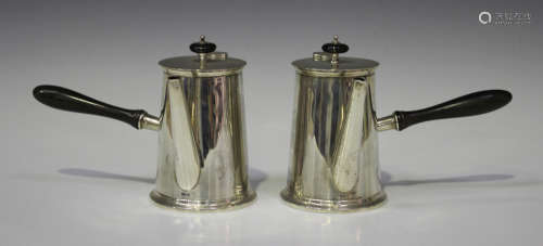 A pair of George V silver café-au-lait pots, each of tapering cylindrical form with turned