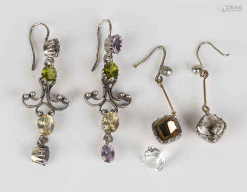 A pair of peridot, amethyst and pale yellow gem set pendant earrings with wire fittings, length 6cm,
