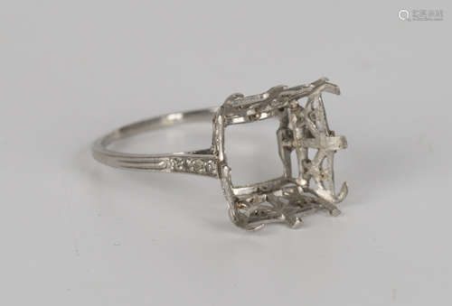 A diamond set platinum ring mount with diamond set four stone shoulders, ring size approx P1/2 (