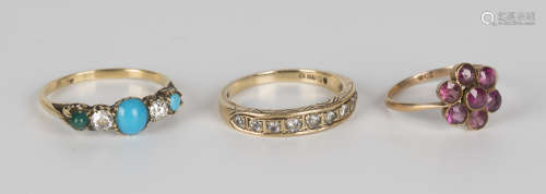 A gold, turquoise and diamond five stone ring, the mount decorated with scroll pierced sides, a