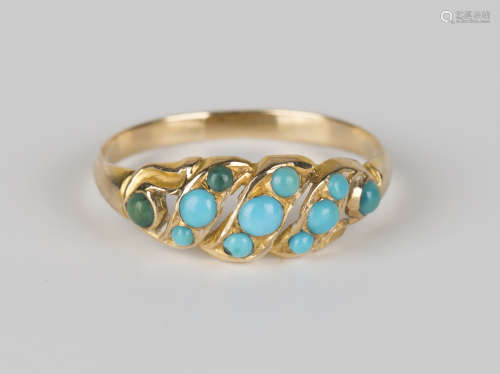A gold and turquoise ring, pierced in a slanting design, ring size approx L.Buyer’s Premium 29.4% (