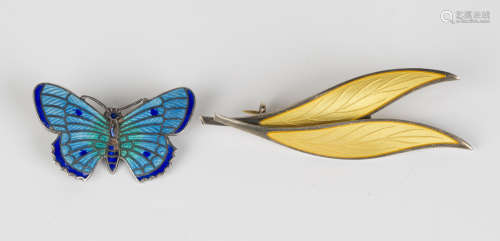 A sterling silver and vari-coloured blue enamel brooch, designed as a butterfly, detailed 'C.T&S