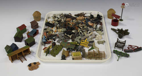 A collection of Britains and other lead farm figures, animals and accessories, including horses,