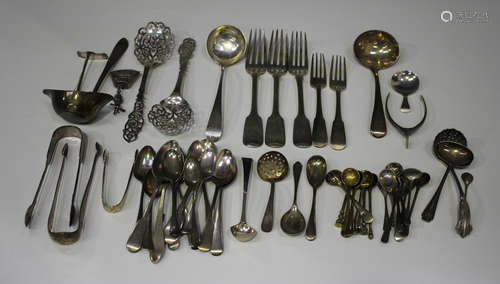 A group of mostly silver cutlery, including a George III Old English pattern caddy spoon, London