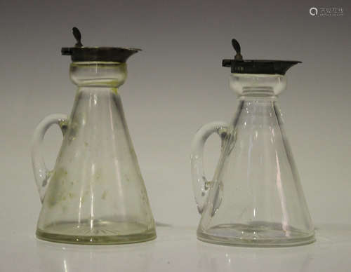 A pair of George V silver mounted clear glass conical whisky tots, each with hinged lid, London 1913