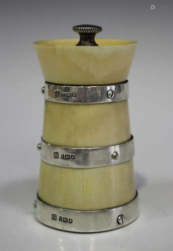 An Edwardian silver banded ivory pepper mill of churn form, London 1904 by Hukin & Heath, height
