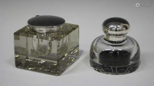 A late Victorian silver mounted cut glass inkwell of compressed circular form, London 1897 by John