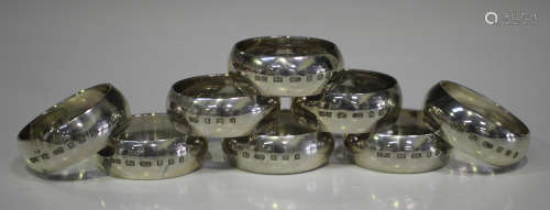 A set of eight Elizabeth II silver plain circular napkin rings, London 2002 by Whitehill Silver &