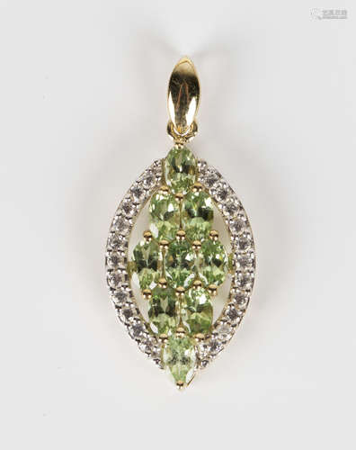 A 9ct gold, colourless gem and tsavorite garnet marquise shaped pendant, mounted with nine