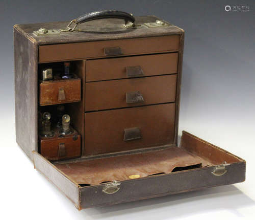 An early 20th century leather medical case by Allen & Hanburys Ltd, the interior fitted with drawers