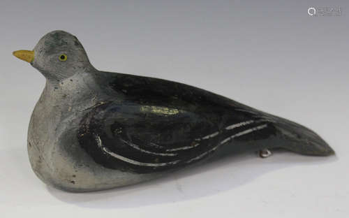 A 19th century French carved and painted decoy pigeon, length 31cm.Buyer’s Premium 29.4% (