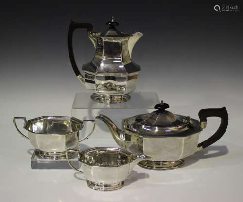 An Art Deco style silver matched four-piece tea set of faceted octagonal form, comprising teapot,
