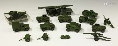 A collection of Dinky Toys army vehicles and accessories, including a No. 677 armoured command