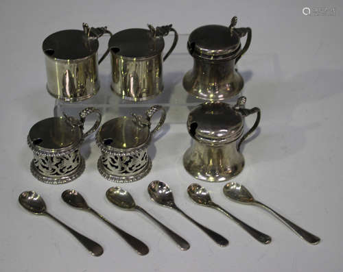 A pair of Edwardian silver cylindrical mustards, Chester 1910 by Stokes & Ireland, together with a